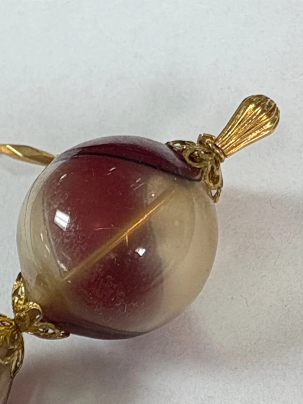 Gold-Tone Stick Brooch with Red and Cream Glass Beads